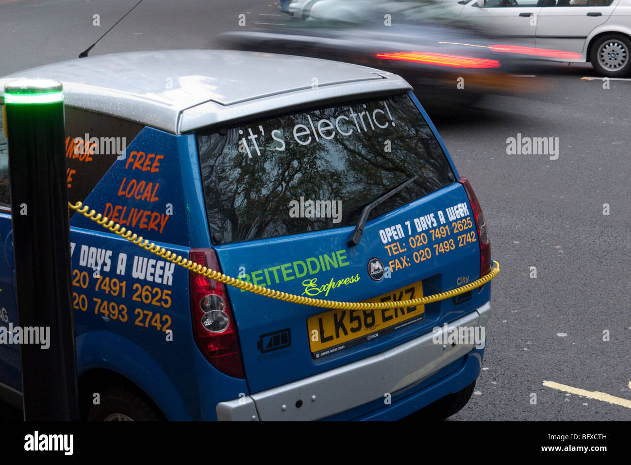 An electric car parked at a charging point in Barclay Square London Stock Photo