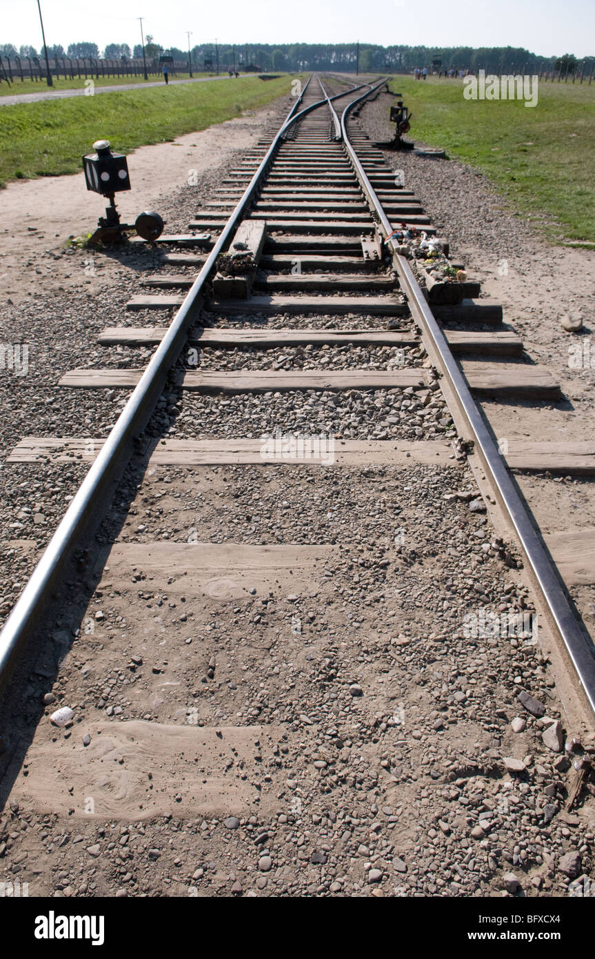 Railway line at the entrance to Auschwitz 11- Birkenau camp, Brzezinka, Poland. Stock Photo