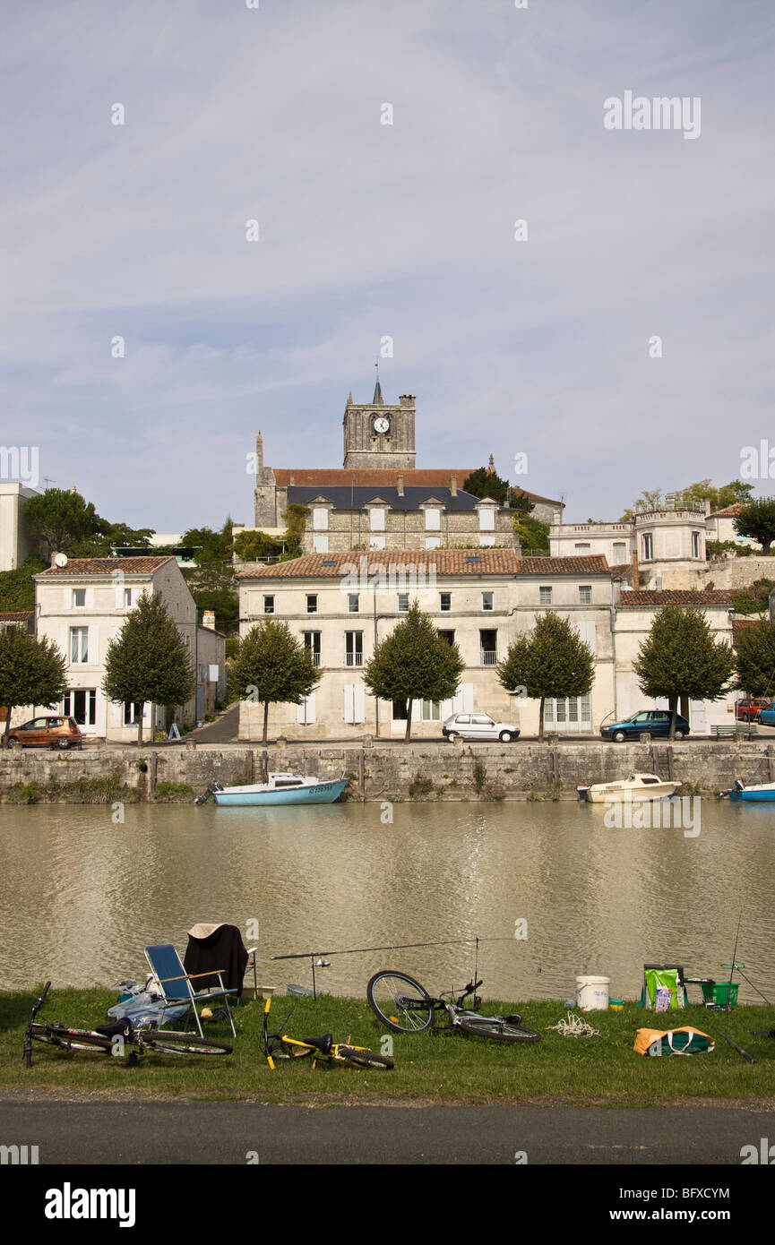 Church on the Charente river, St.Savinien, France Stock Photo