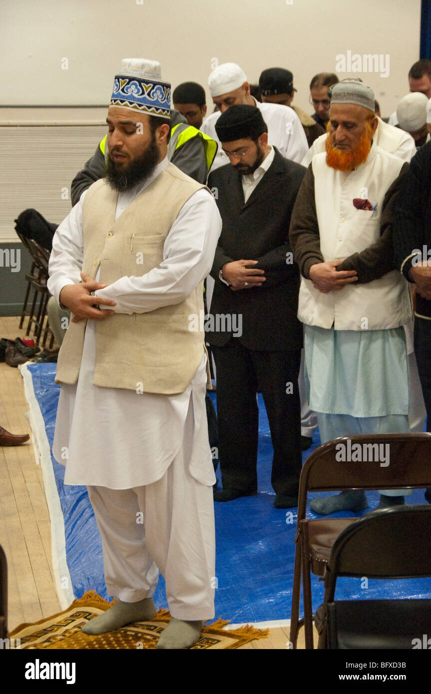 Men at prayers at Eid Milad-Un-Nabi Celebrations at Sunni Muslim Association, Tooting, London. Stock Photo