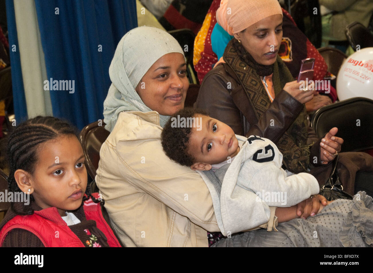 Women and children enjoy Eid Milad-Un-Nabi Celebrations at Sunni Muslim Association, Tooting, London. Stock Photo