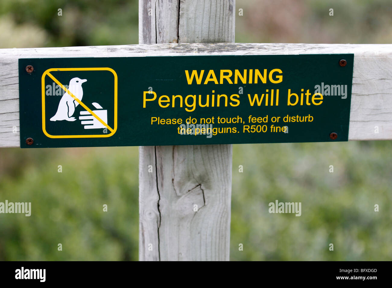 Warning sign at Boulders Beach penguin breeding colony in Simon,s Town