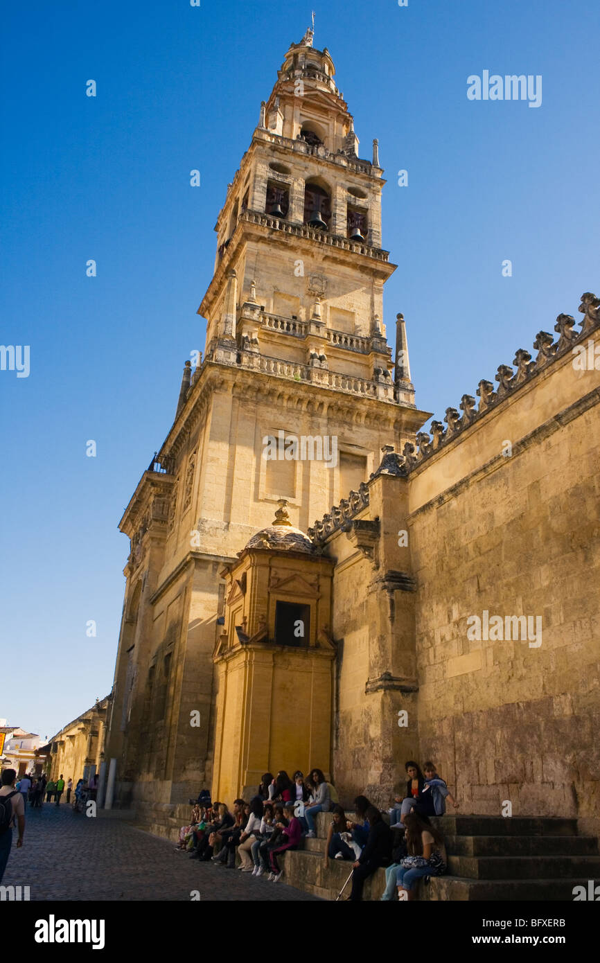 Tourists sat outside The Great Mosque, Cordoba, Spain. Stock Photo