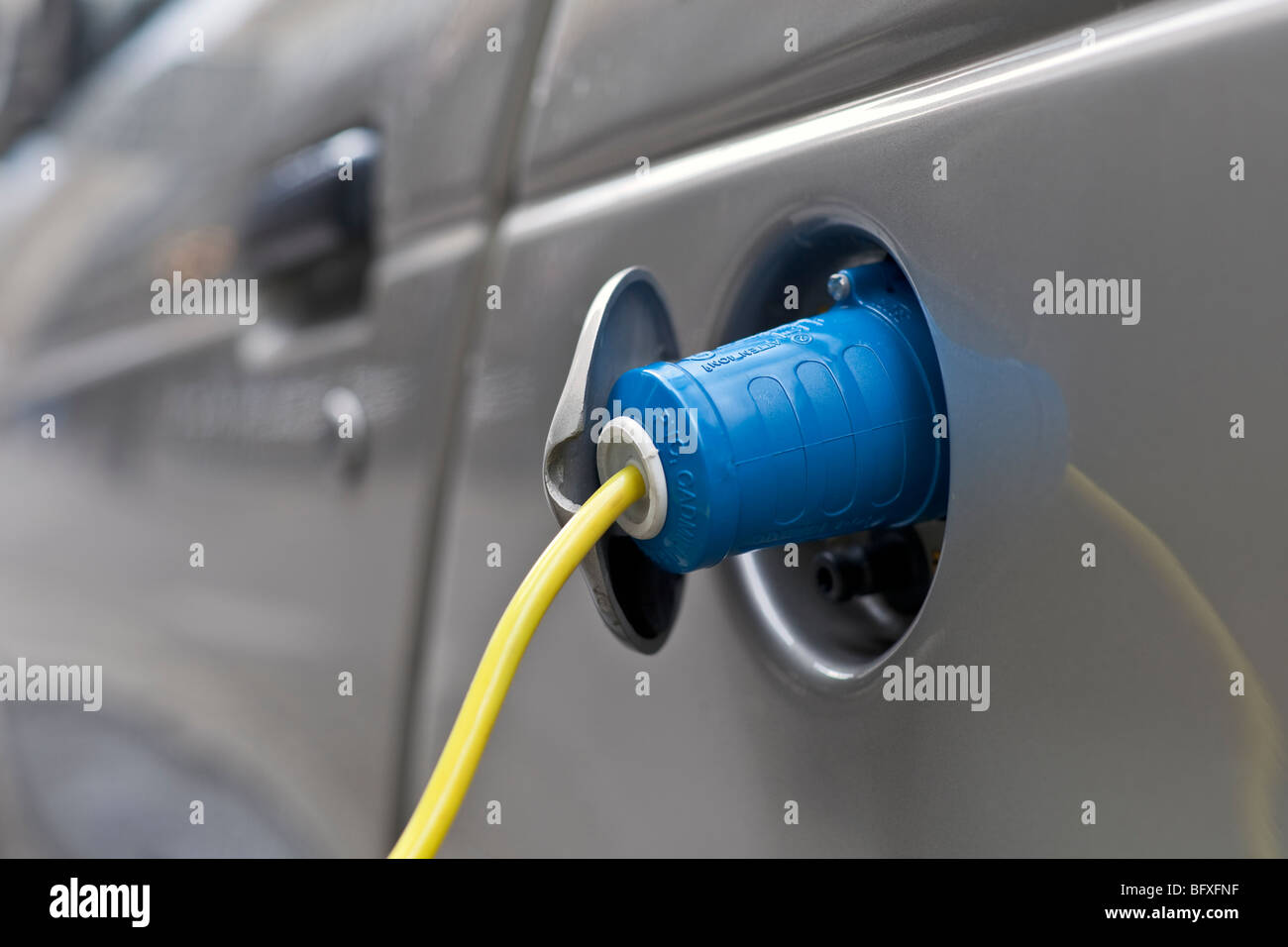 An electric powered vehicle at charging bay  / electrobay, London, UK Stock Photo