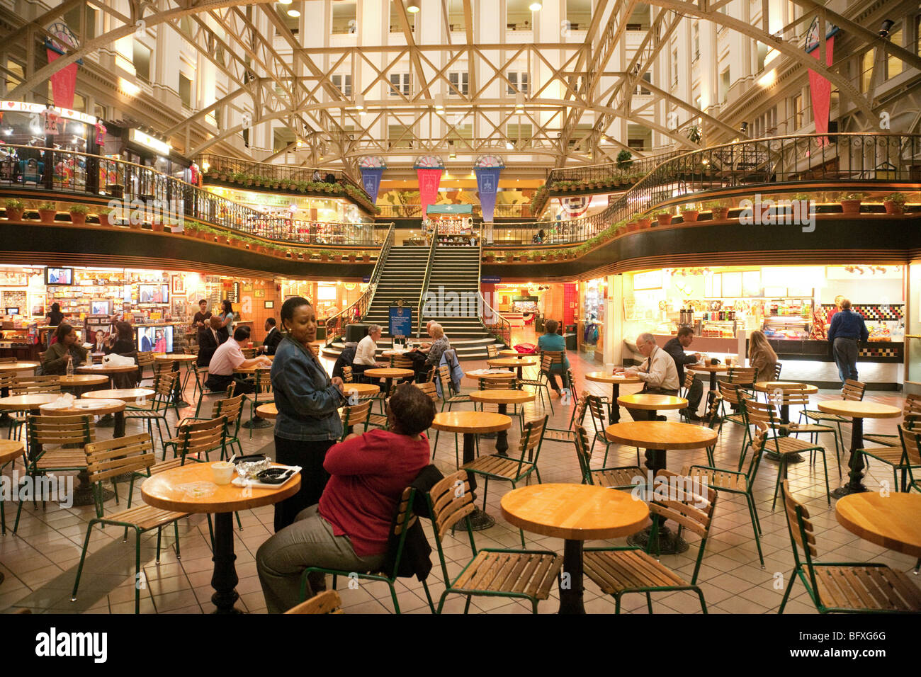 Tourists eating in the cafe in the Old Post Office building, Pennsylvania Avenue, Washington DC USA Stock Photo