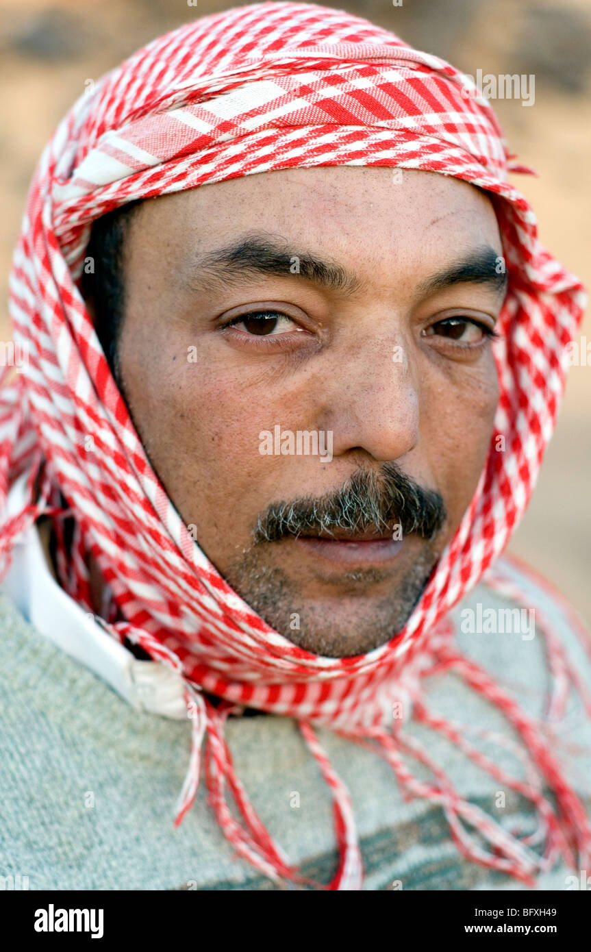 A closeup facial portrait of a middle age Middle Eastern, Egyptian Arab Bedouin man, living in Dakhla Oasis, in the New Valley, Western Desert, Egypt. Stock Photo