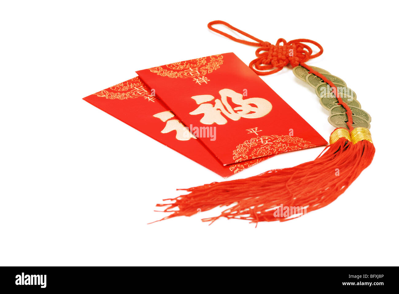 Chinese red envelope with coins and money isolated on white
