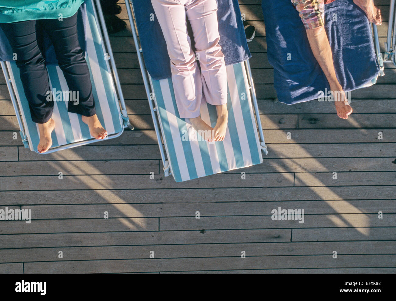 Row women sunbeds hires stock photography and images Alamy