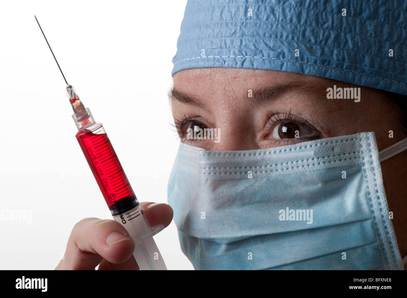 medical technician and hypodermic needle in hospital lab Stock Photo Alamy