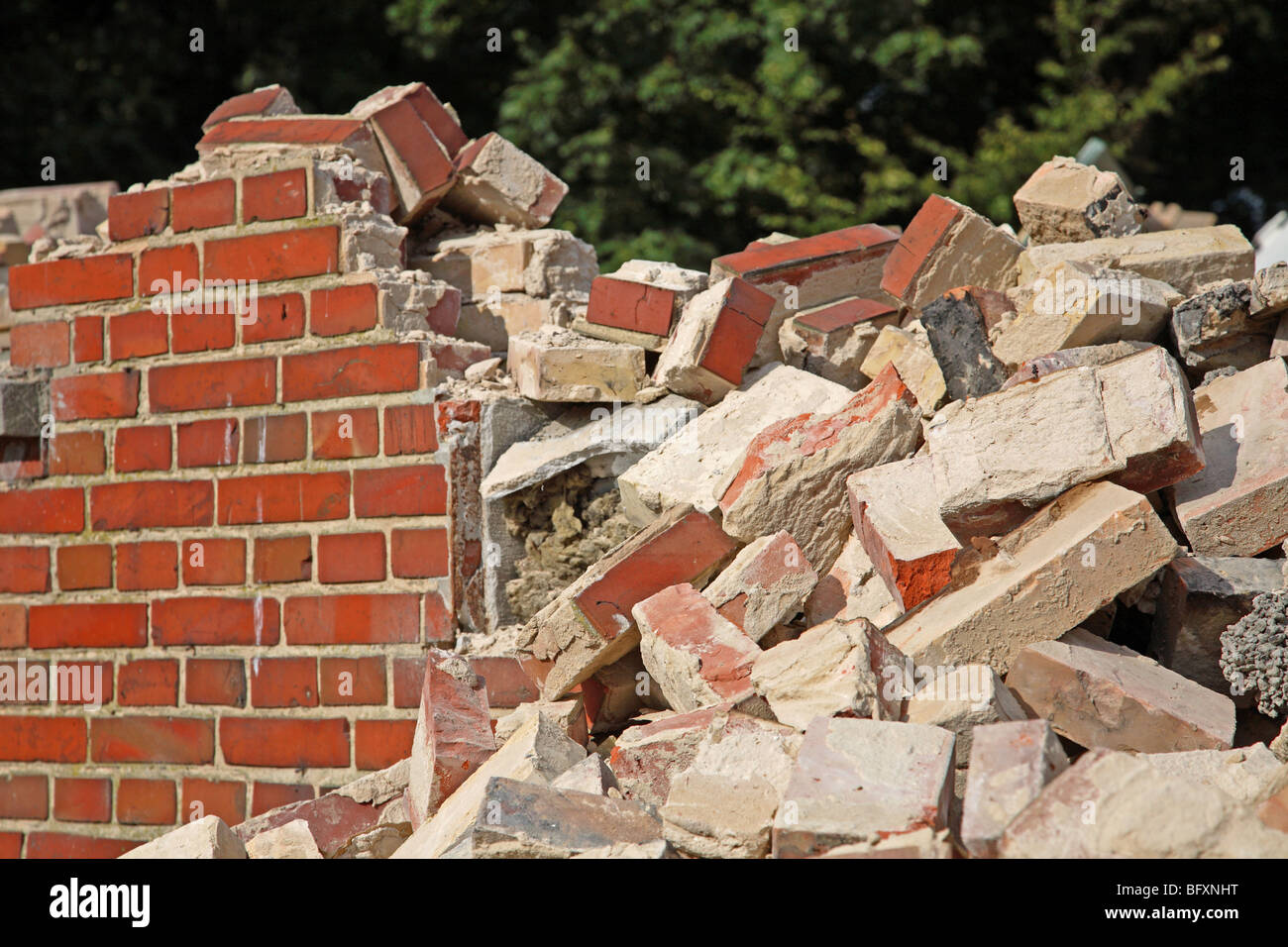 Demolition of a red brick wall Stock Photo Alamy