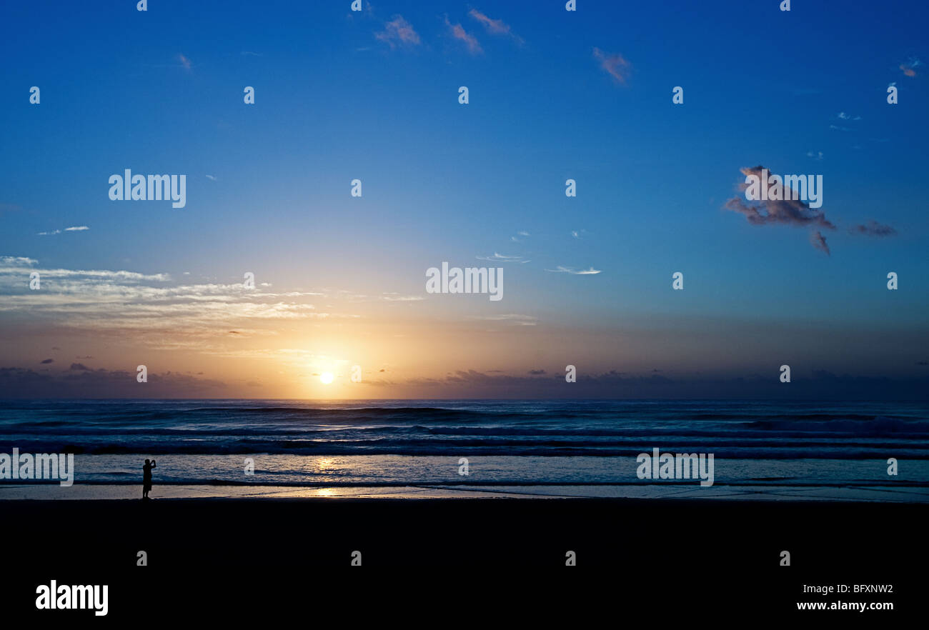 Photography of a Distance Person Photographing the Sunrise on Fraser Island, Queensland, Australia Stock Photo