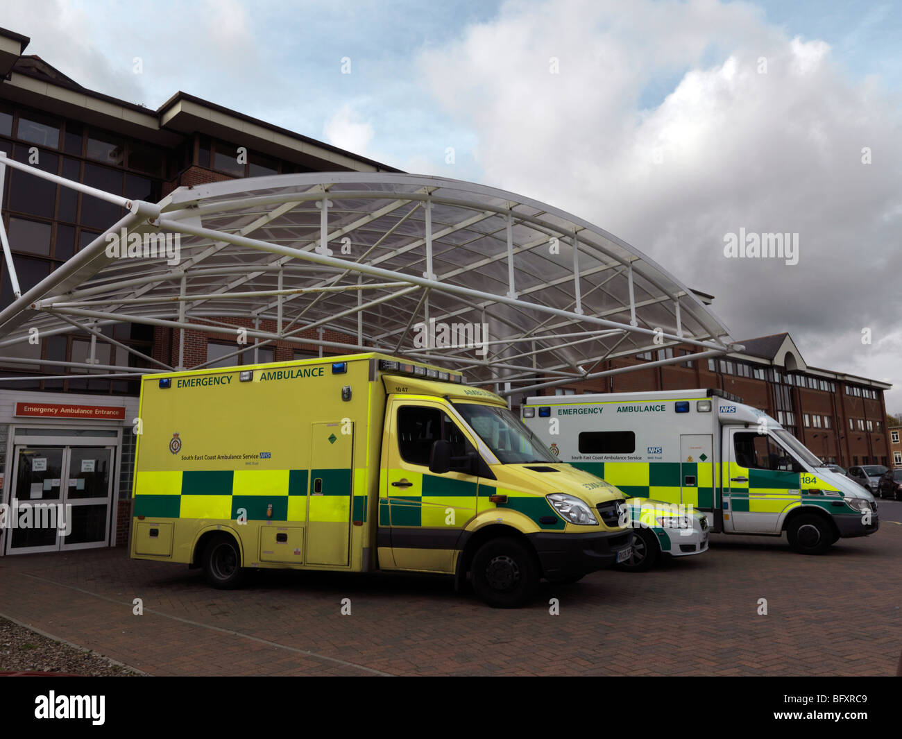 Ambulances Outside the Accident and Emergency Epsom Distrcit Hospital Surrey England Stock Photo