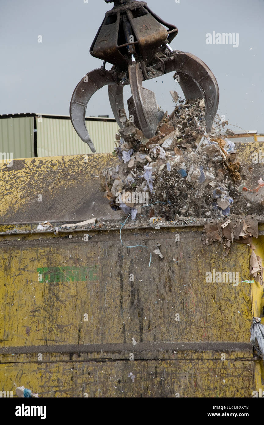 Close up of a mechanical grabber at a materials recycling facility in England. Stock Photo