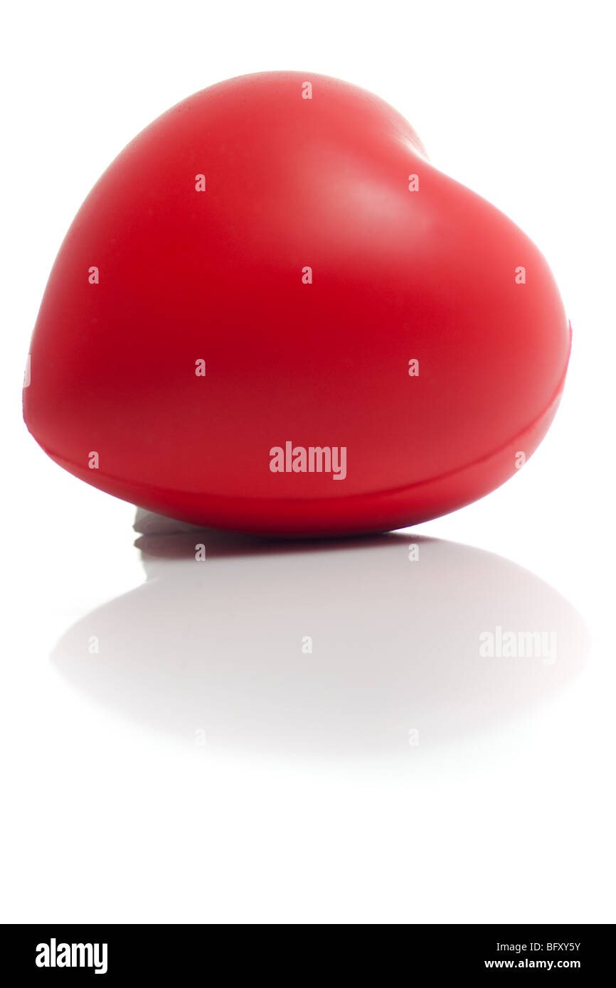 A red valentines day heart, isolated on white Stock Photo - Alamy