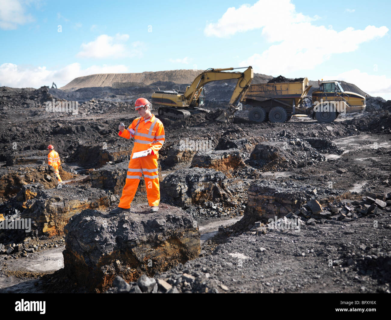 Worker Surveying Coal Mine Stock Photo