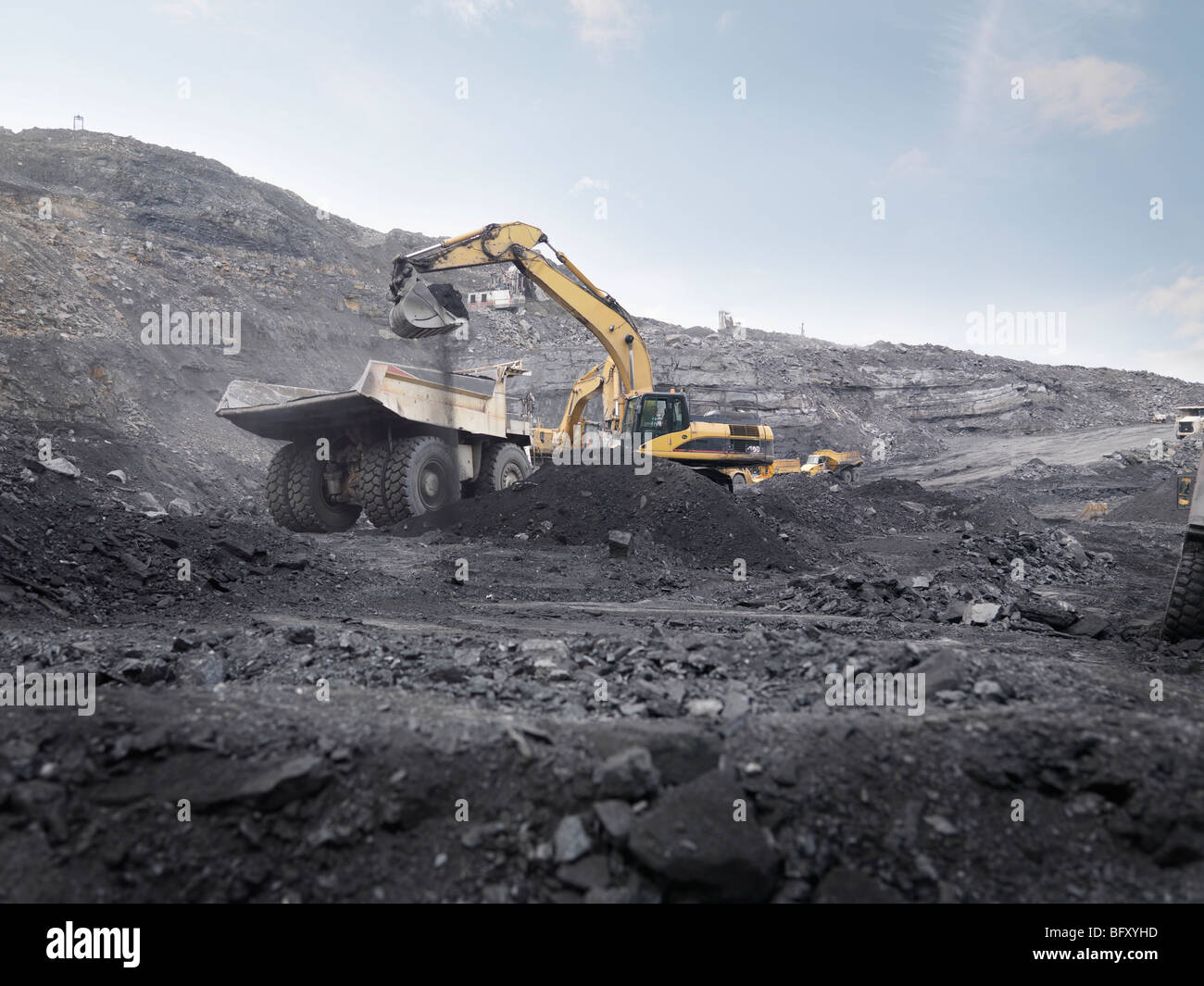 Digger Working In Coal Mine Stock Photo