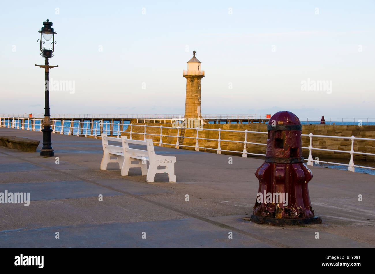 Whitby pier at sunset Stock Photo Alamy