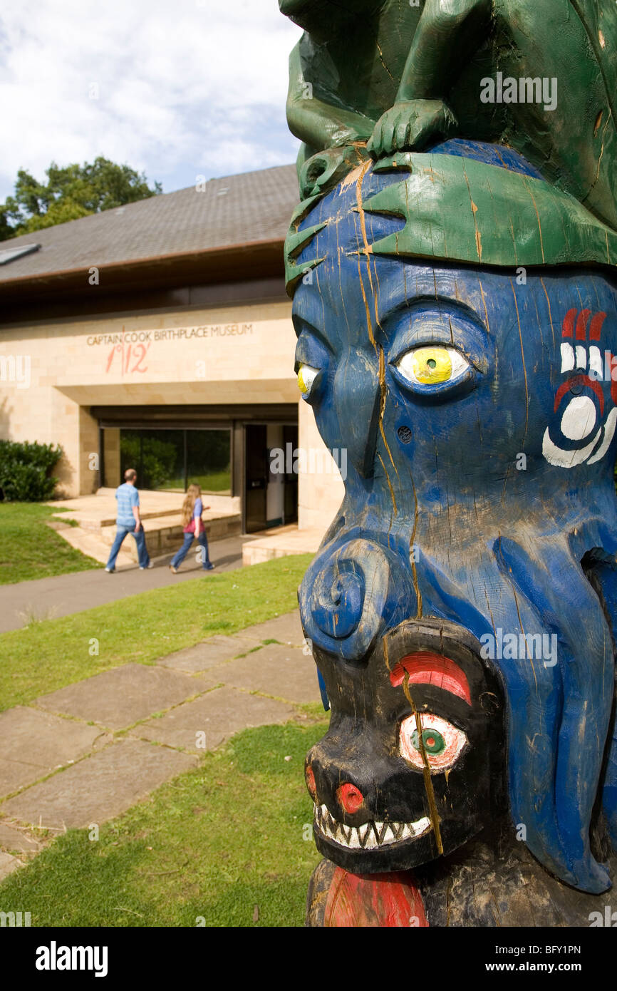 A totem pole stands outside of the Captain Cook Birthplace Museum at Marton-in-Cleveland, England. Stock Photo