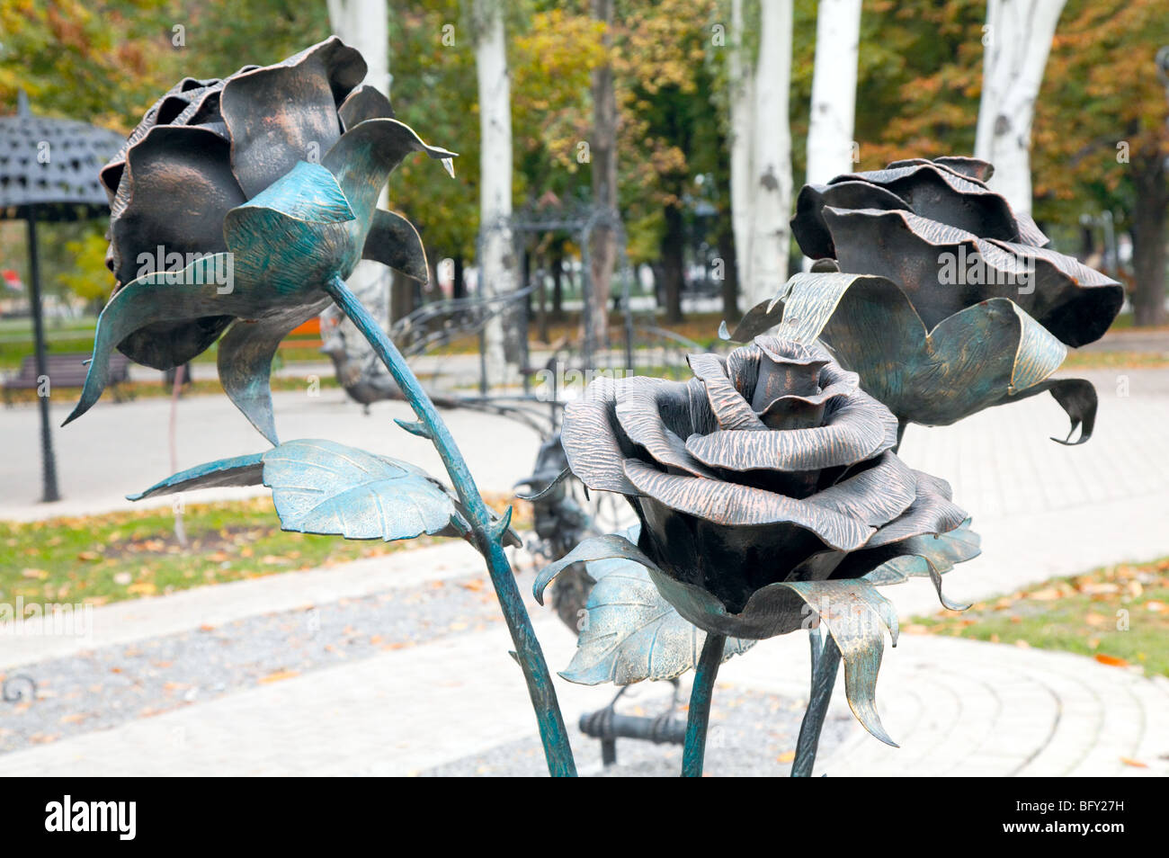 forged figure of rose flower in public "Park of forged figures" in center of Donetsk City (Ukraine) Stock Photo