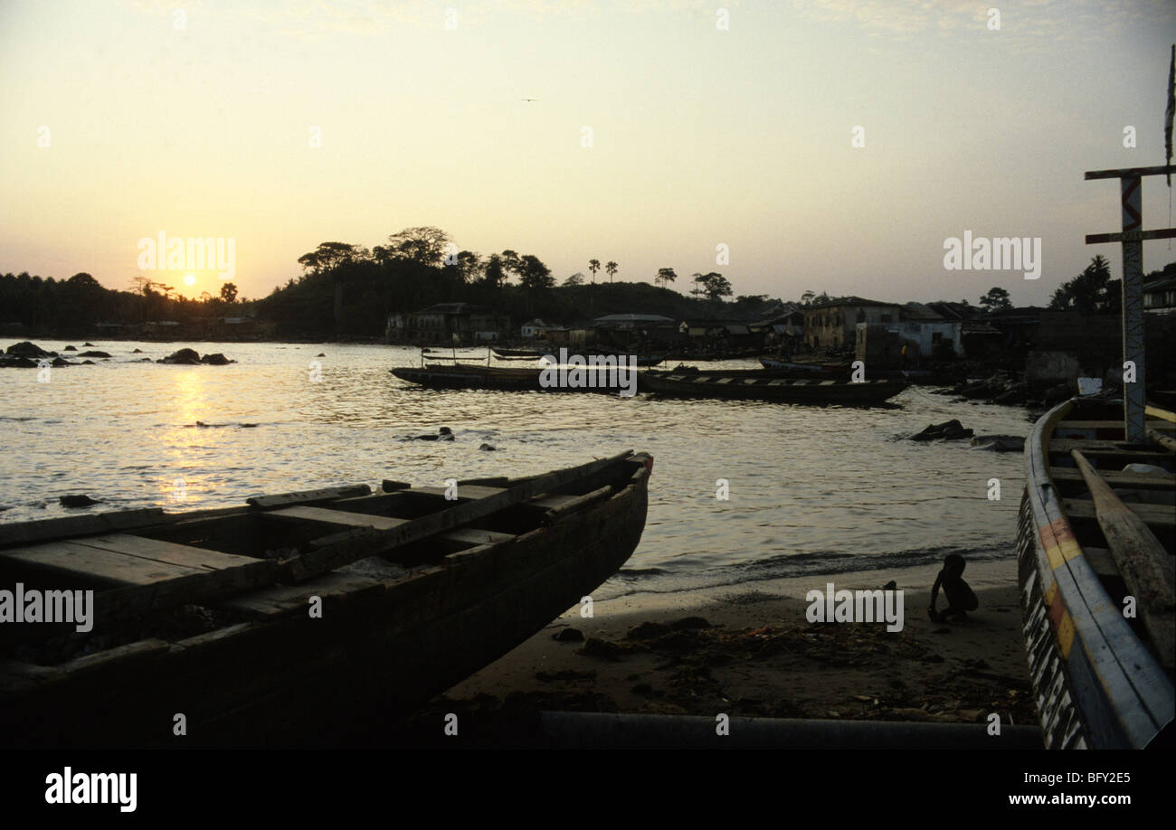 Ghana Dixcove Fishing canoes at sunset Stock Photo