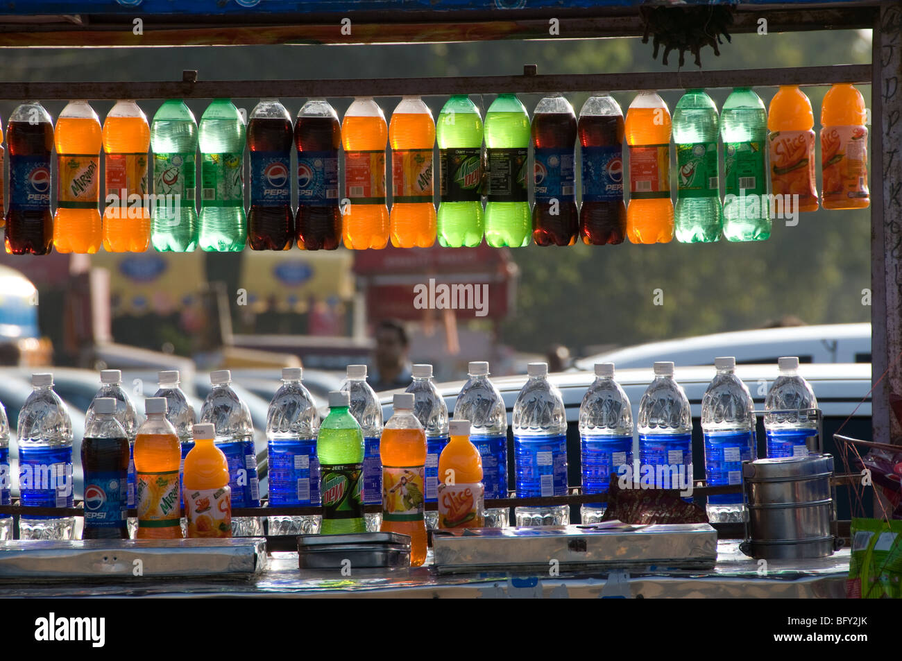 Soft drinks and water for sale on a street vendors trolley near India
