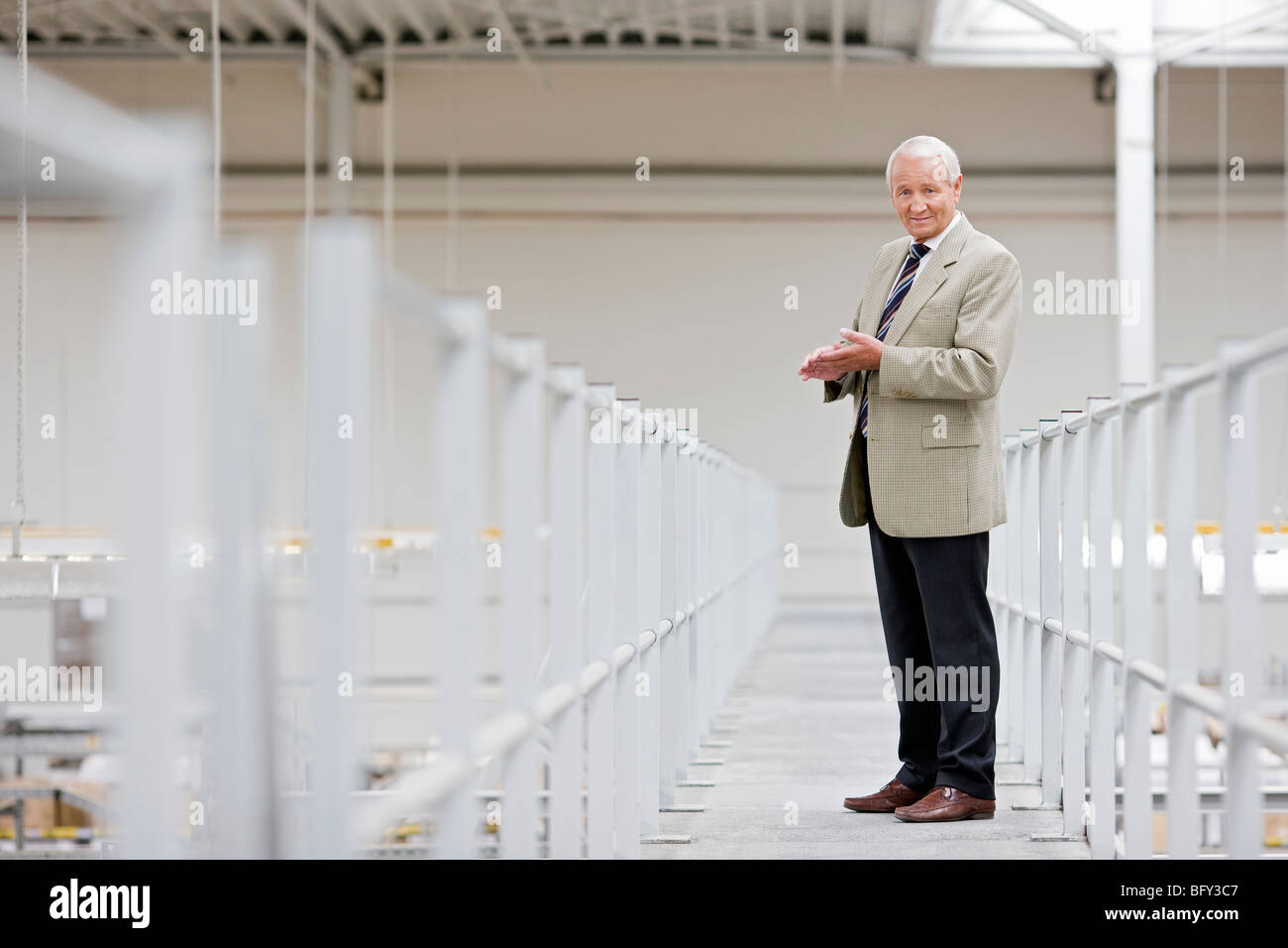 man in charge in storage Stock Photo