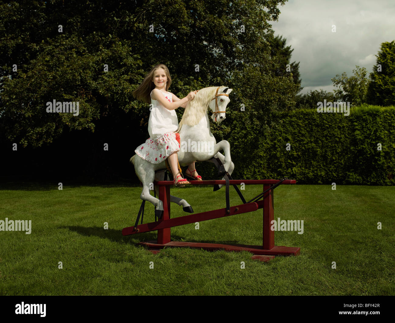 girl on a rocking horse