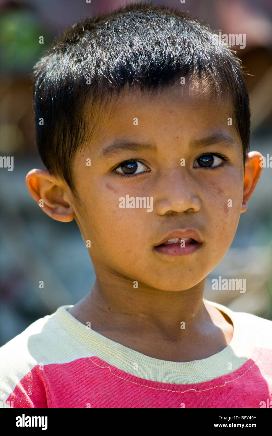 Young boy on Lombok Island in Indonesia Stock Photo - Alamy