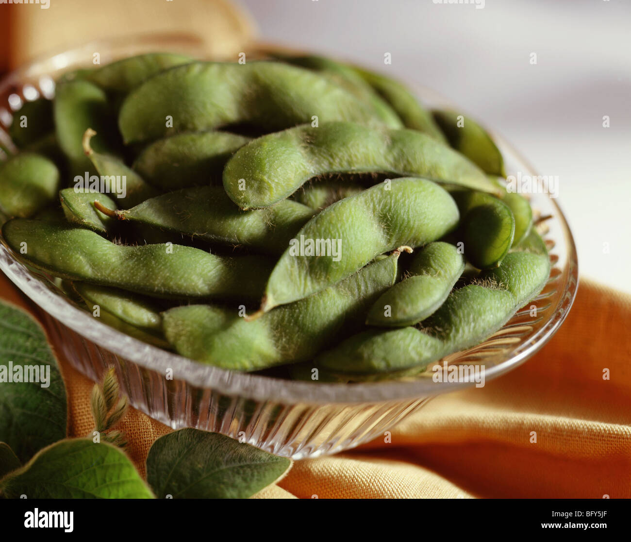 Fresh edamame in glass bowl Stock Photo - Alamy