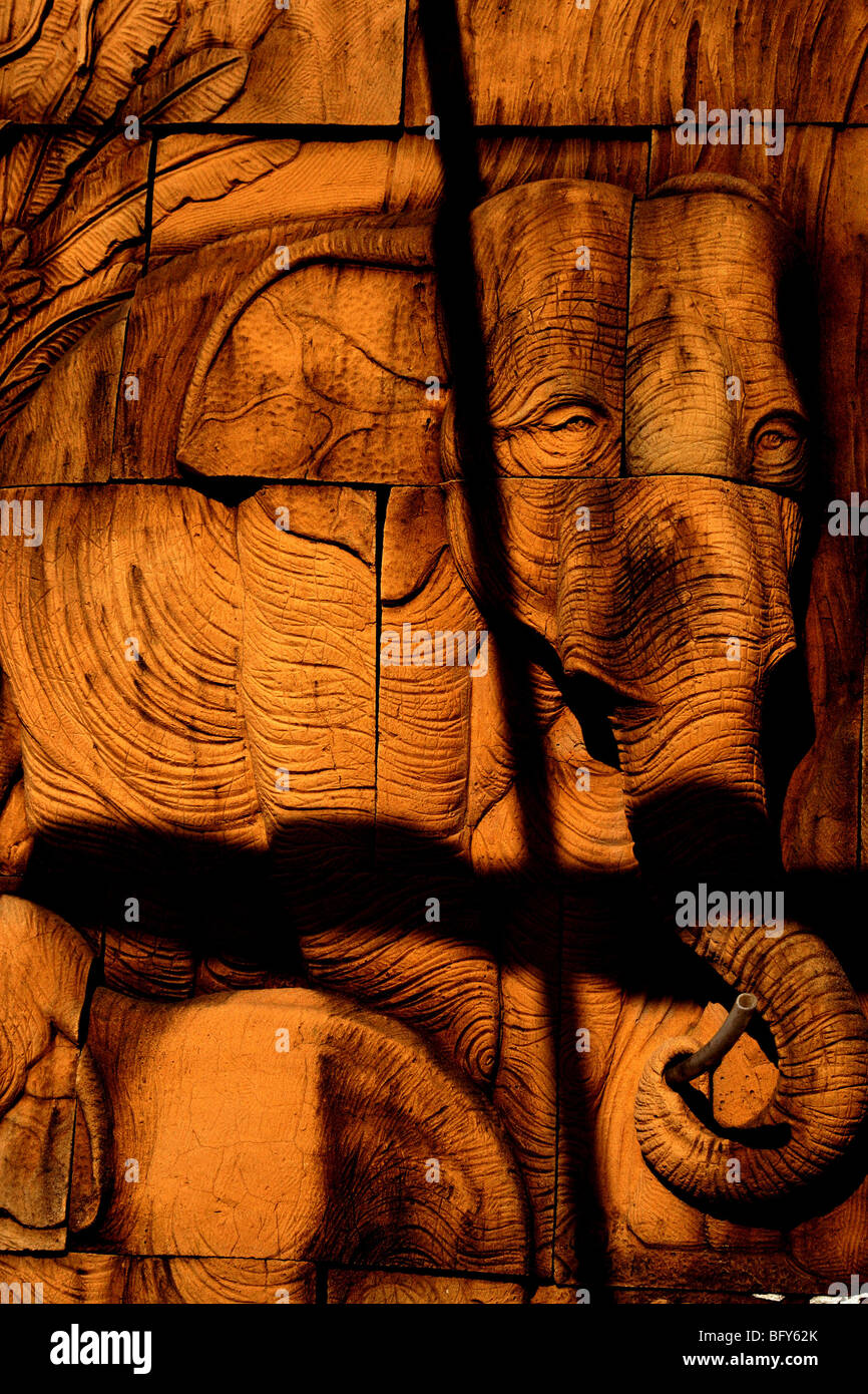Elephant carved on wood, Thailand Stock Photo