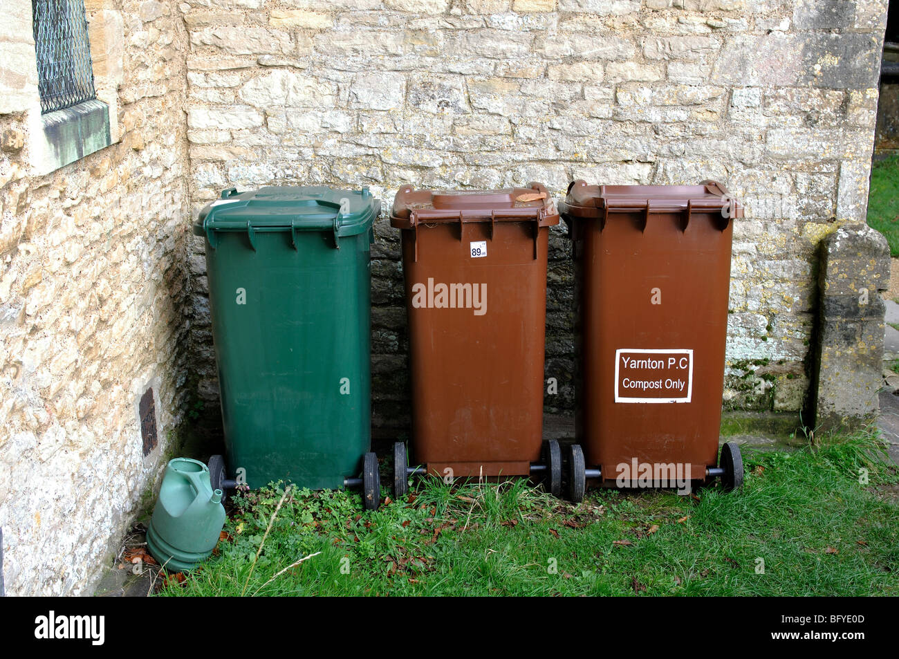 Churchyard recycling bins, Yarnton, Oxfordshire, England, UK Stock