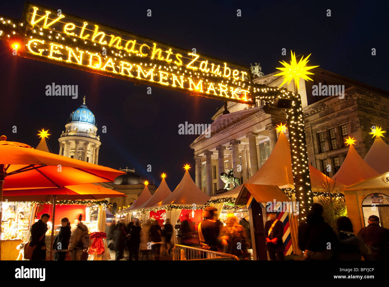 Evening view of traditional German Christmas Market at Gendarmenmarkt in Berlin Germany Stock Photo