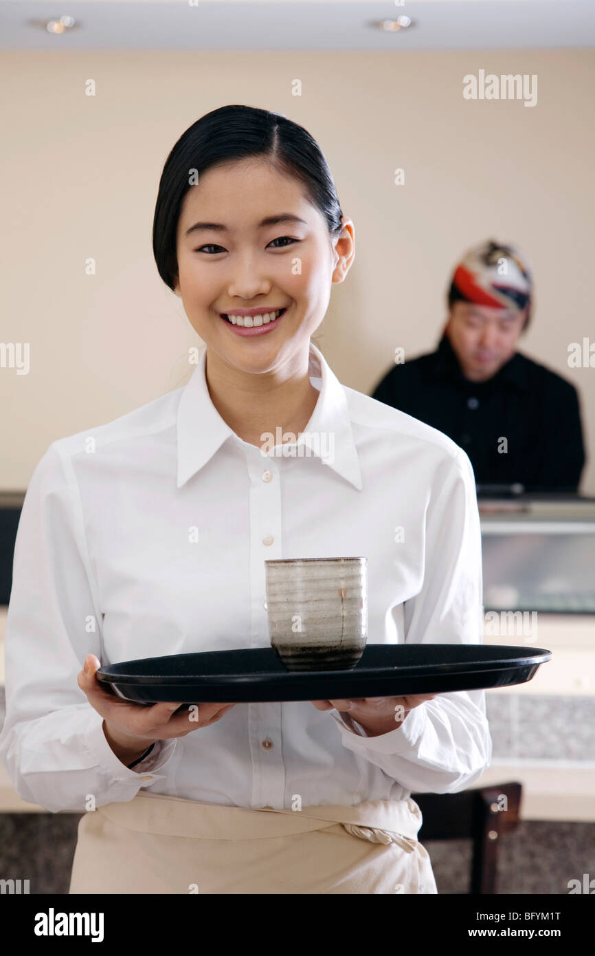 portrait of young japanese waitress Stock Photo Alamy