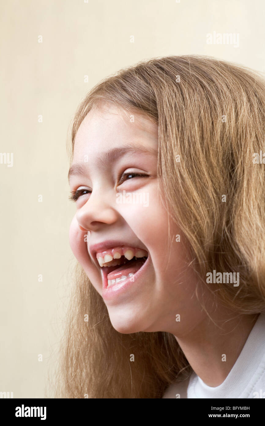 headshot of laughing young girl Stock Photo - Alamy