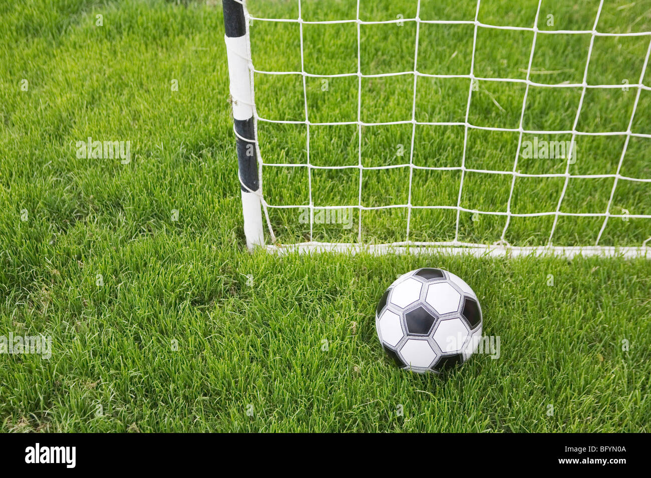 still life of football and goal Stock Photo