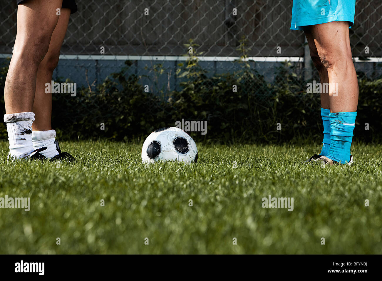 detail of two female football players standing face to face Stock Photo