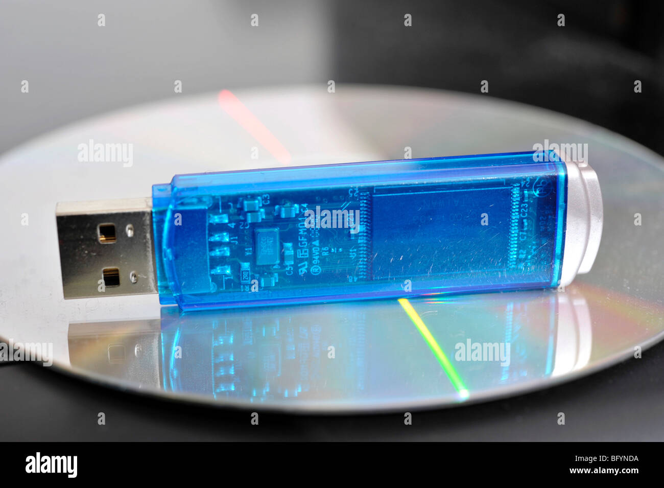 USB flash drive on a CD-ROM Stock Photo