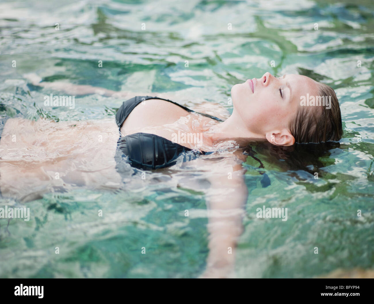 woman swimming eyes closed Stock Photo