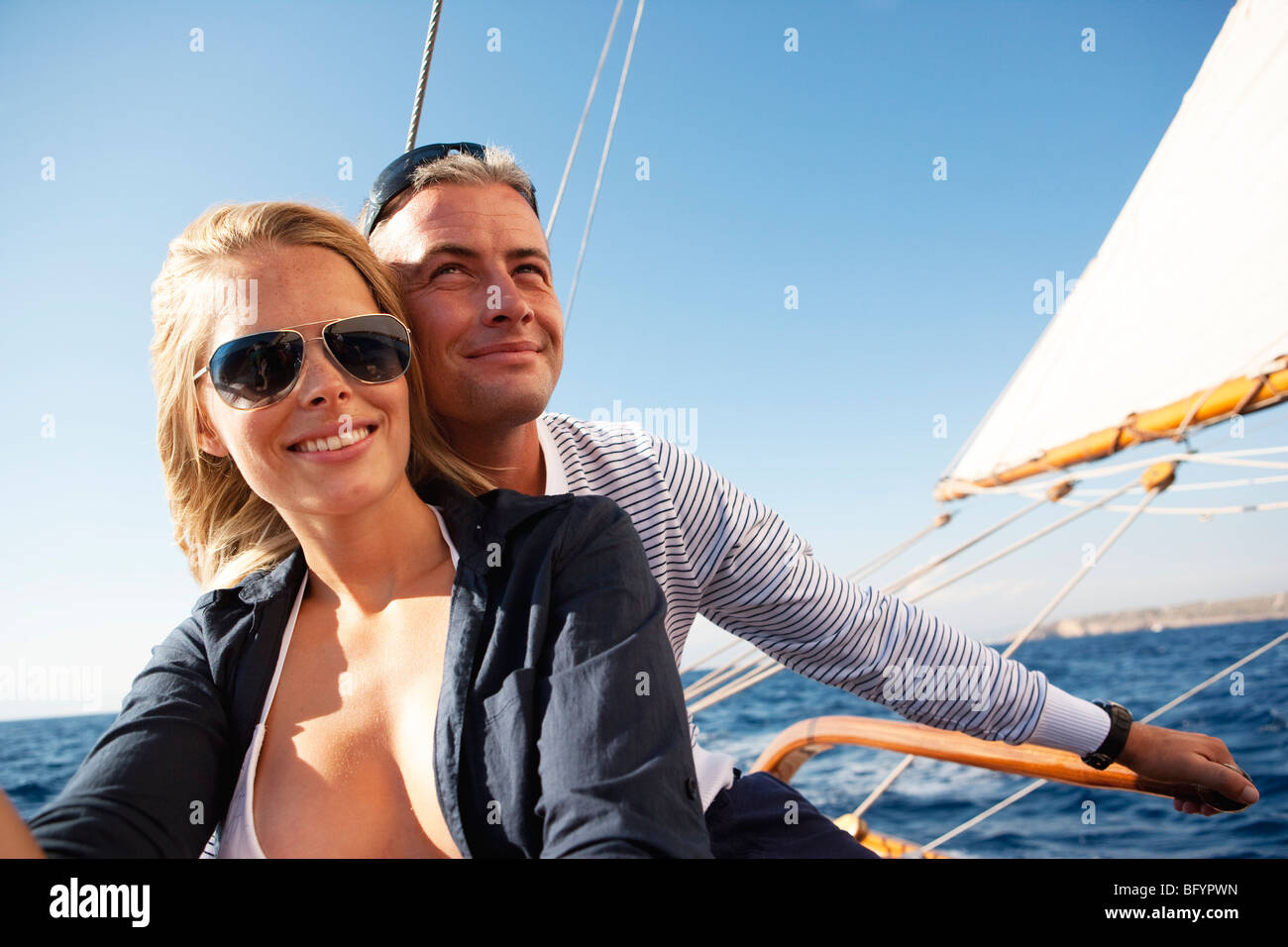couple steering a sailing boat Stock Photo 27040881 Alamy
