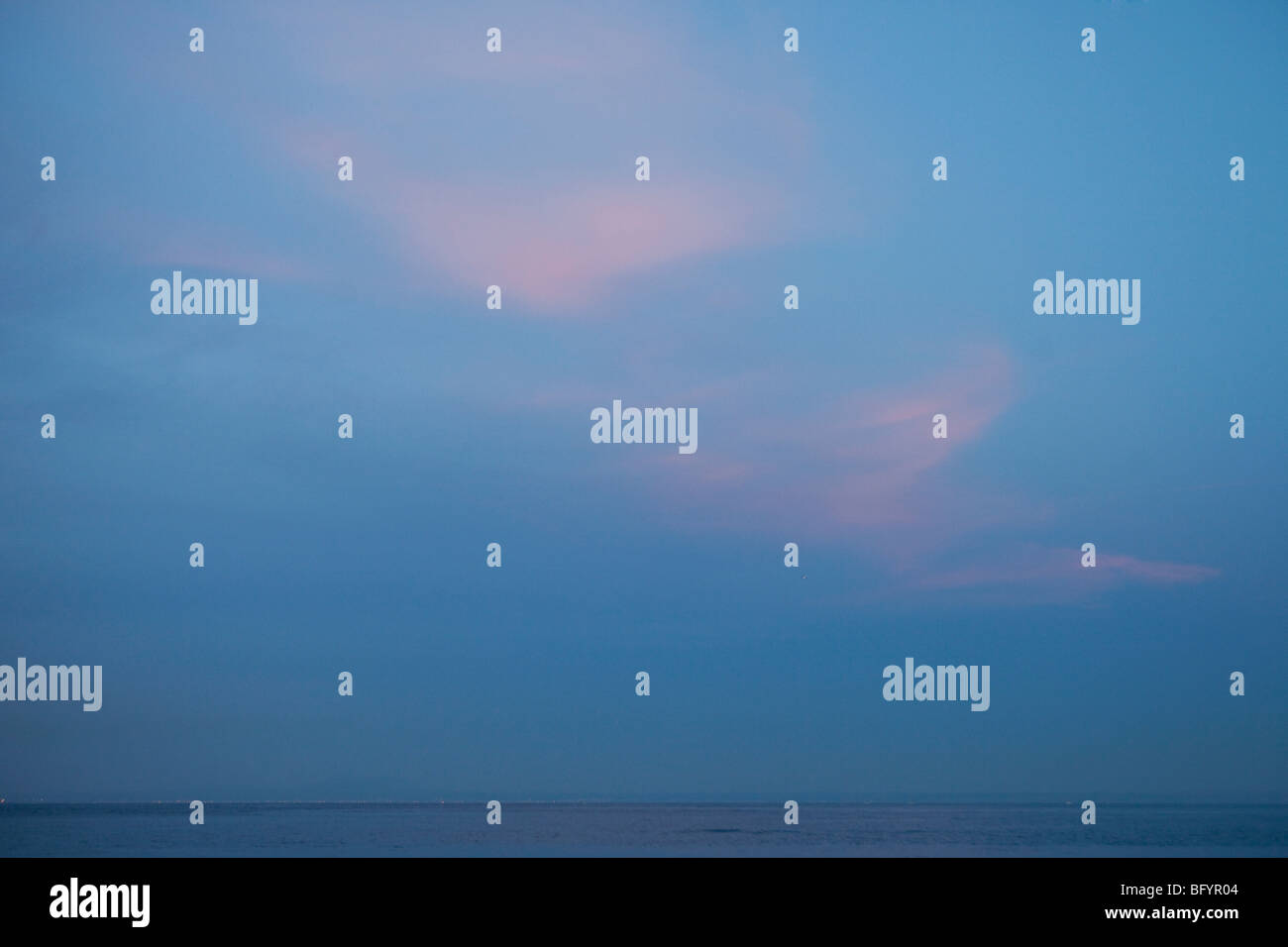 dawn over the sea with clouds Stock Photo - Alamy