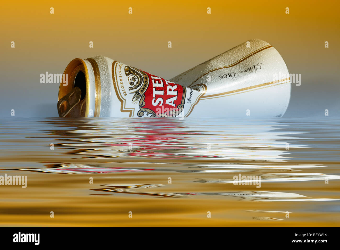 Empty Can of Lager floating on Water Stock Photo