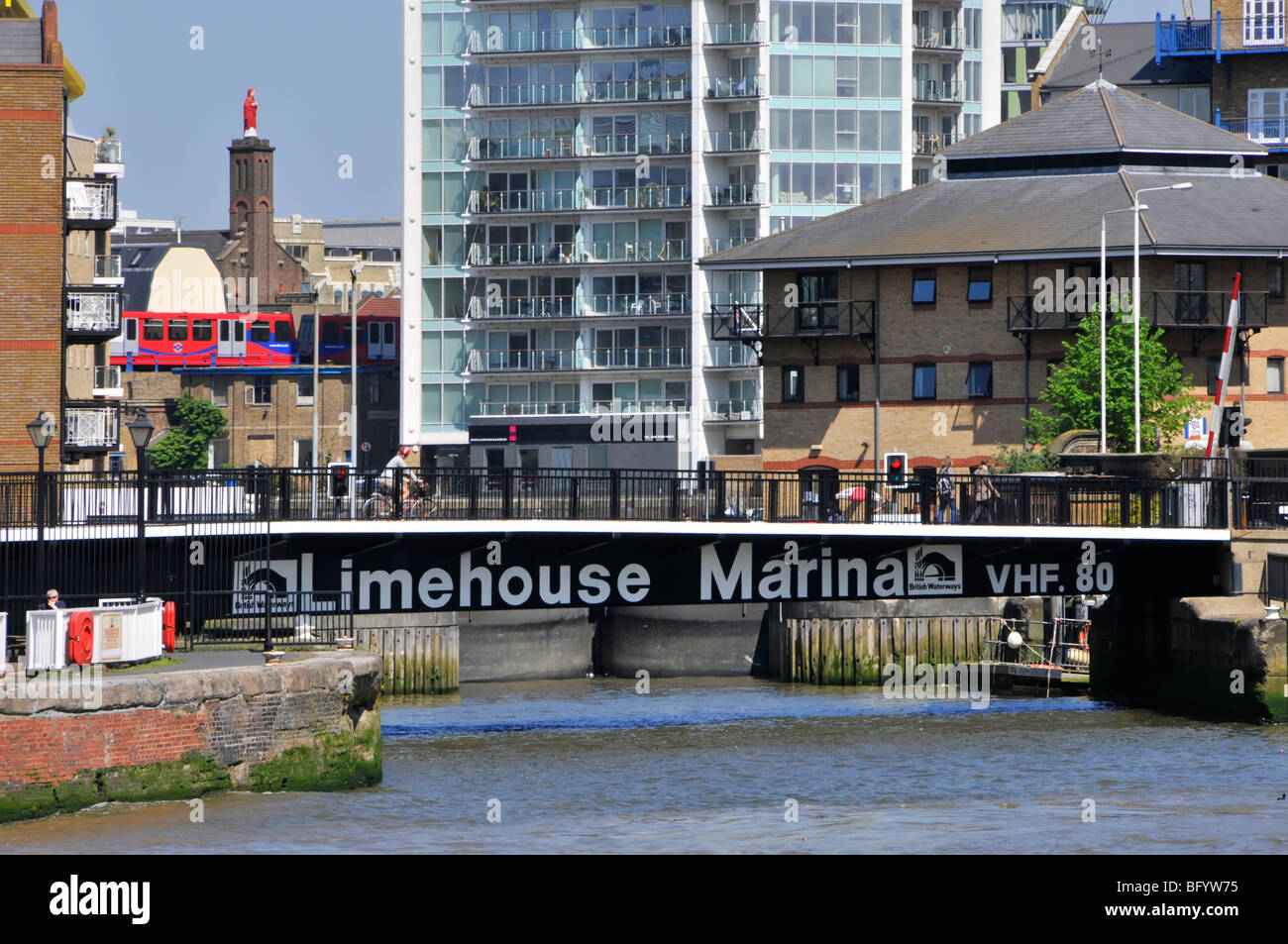 Road swing bridge giving access from River Thames to locks, Limehouse Marina & canals Stock Photo