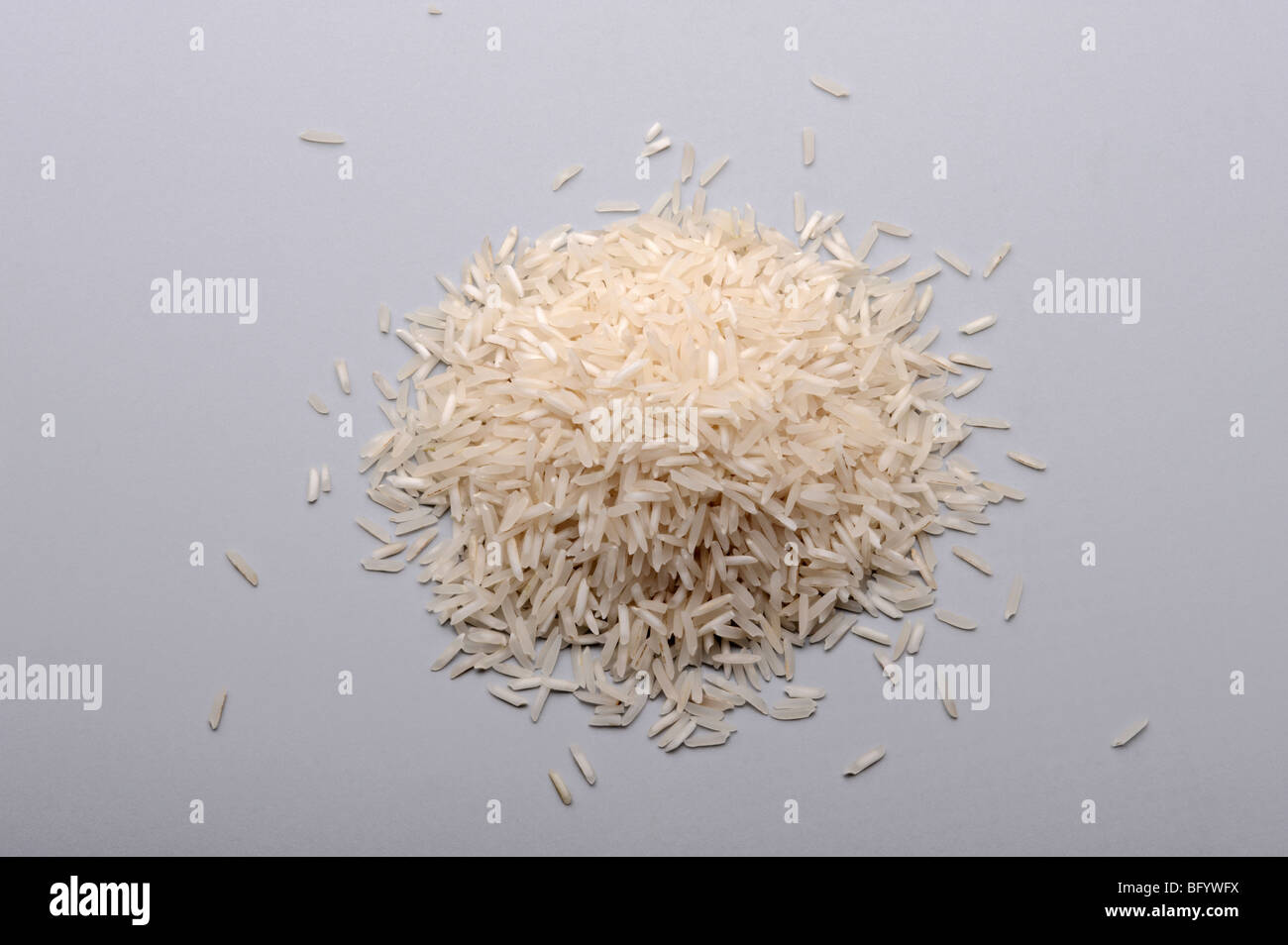 Pile of Basmati rice, uncooked Stock Photo Alamy