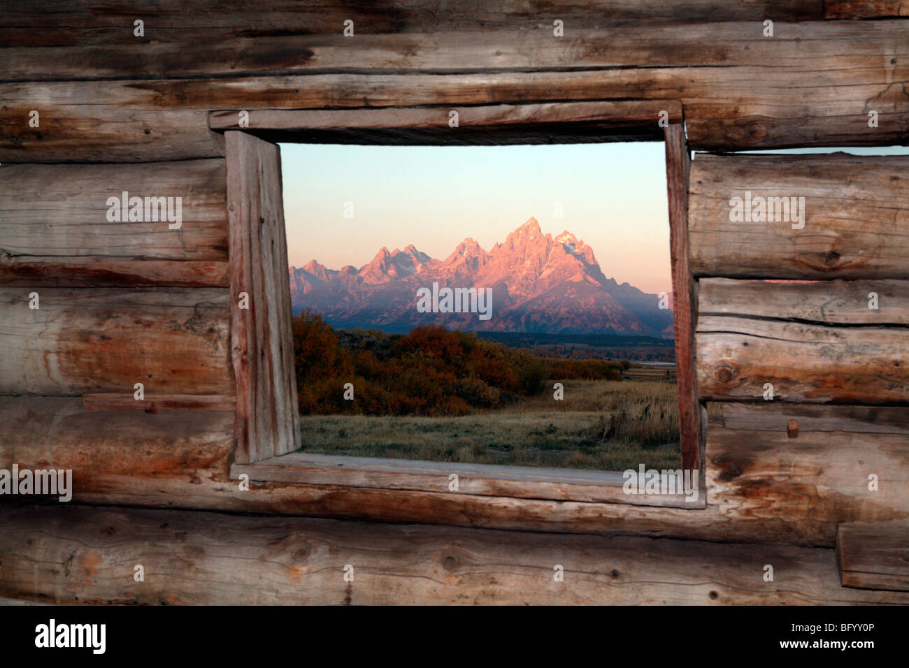 USA, Wyoming, Grand Teton NP, Snake River with aspen grove, autumn Teton Range in background, view from Cunningham Cabin Stock Photo