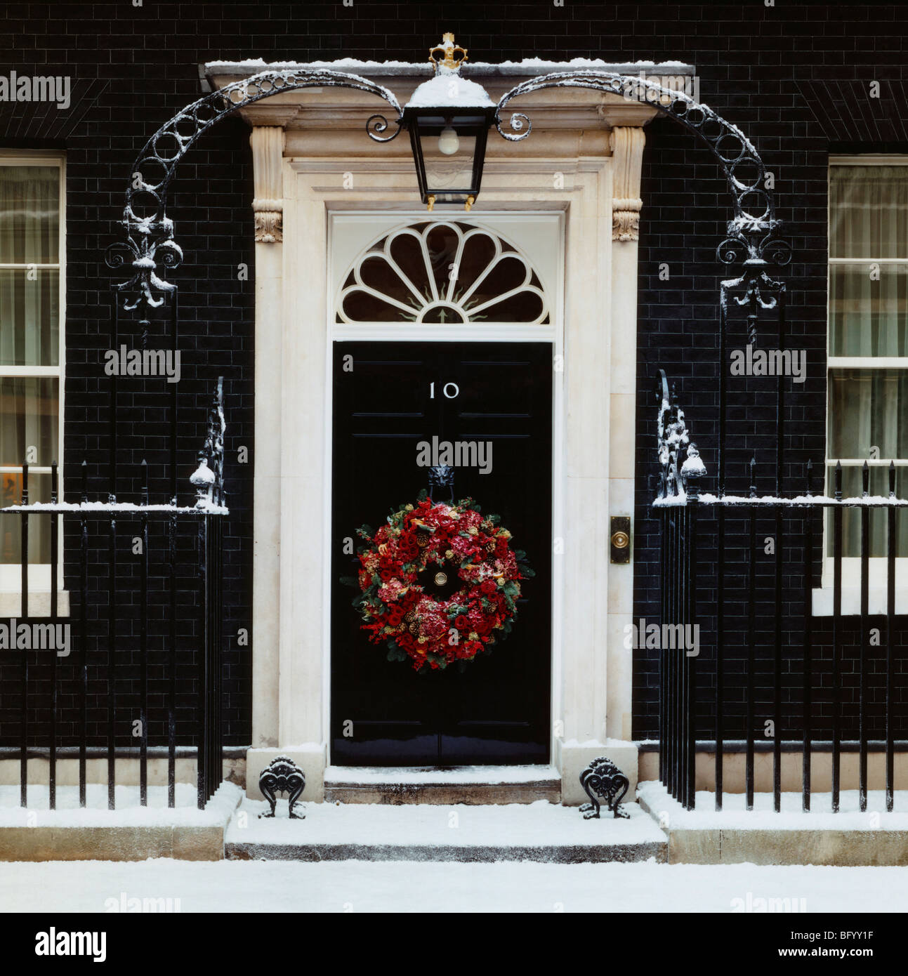 Door of Number 10 Downing Street in snow Stock Photo