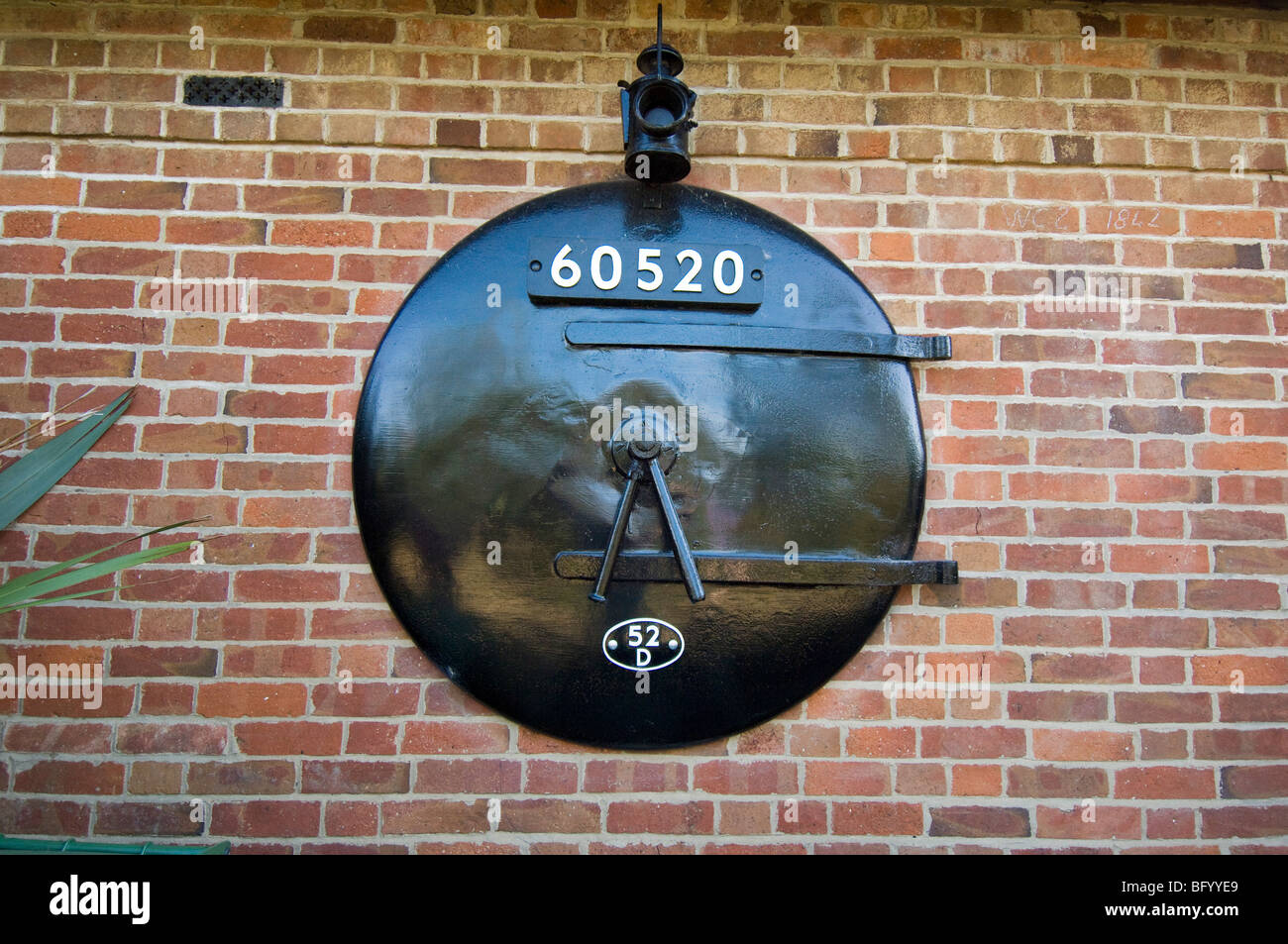 Smokebox door from steam mounted on a wall Stock Photo Alamy