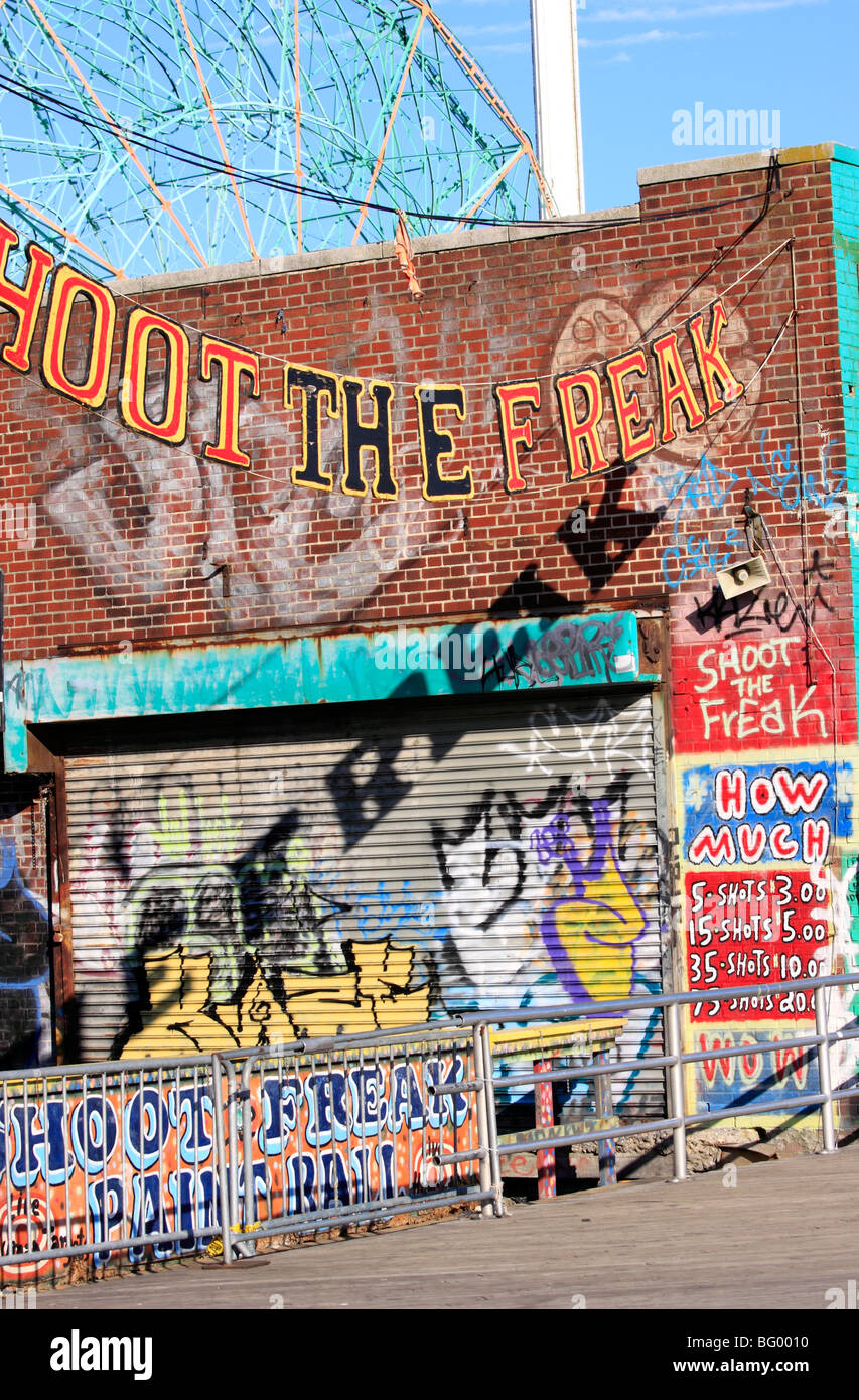 The 'Shoot the Freak' paintball arcade game, Coney Island boardwalk, Brooklyn, NY Stock Photo