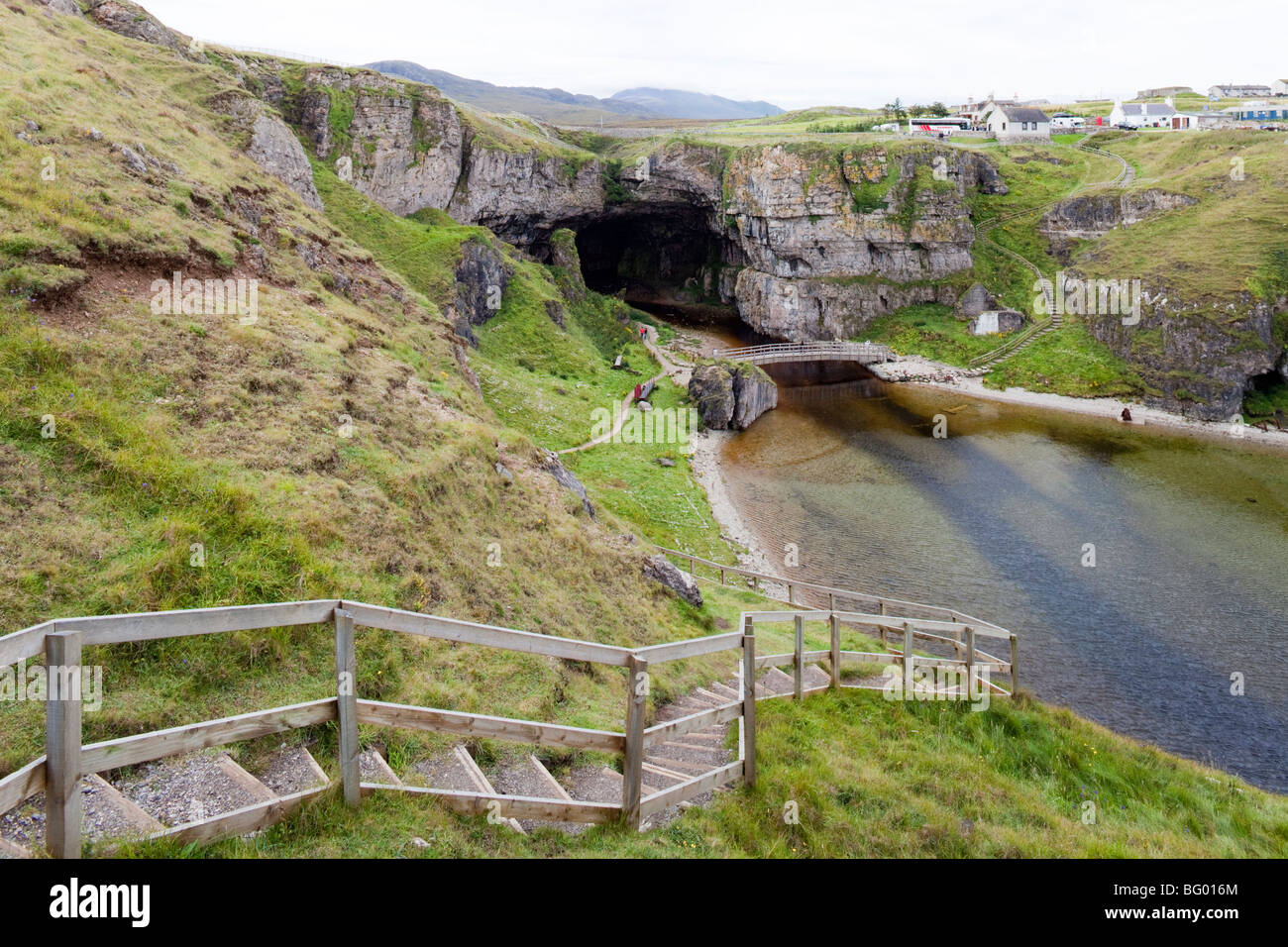 The river Allt Smoo emerging from the entrance to Smoo Cave at Durness, Highland, Scotland Stock Photo