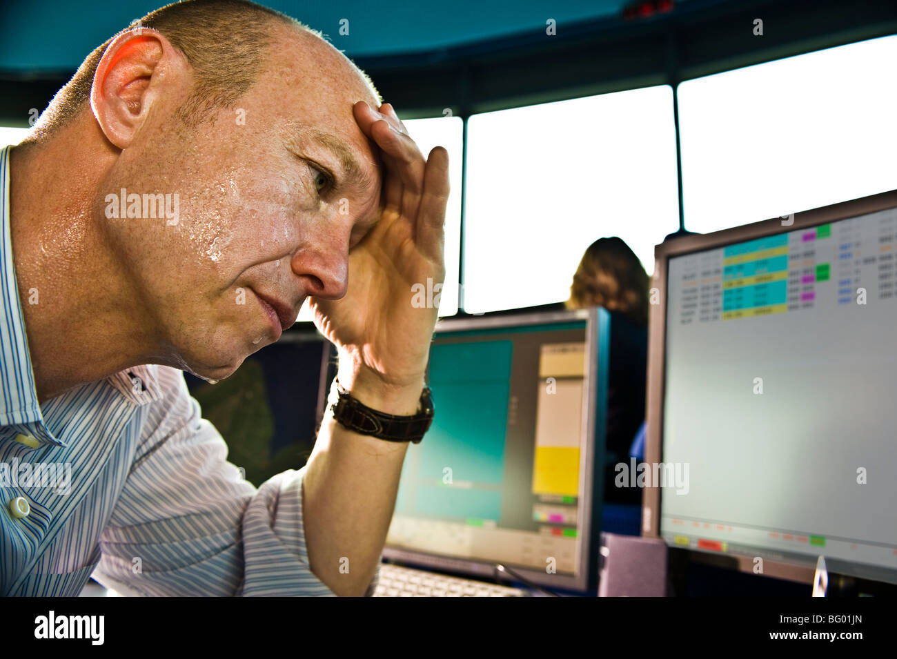 Office operator stress at the computer Stock Photo