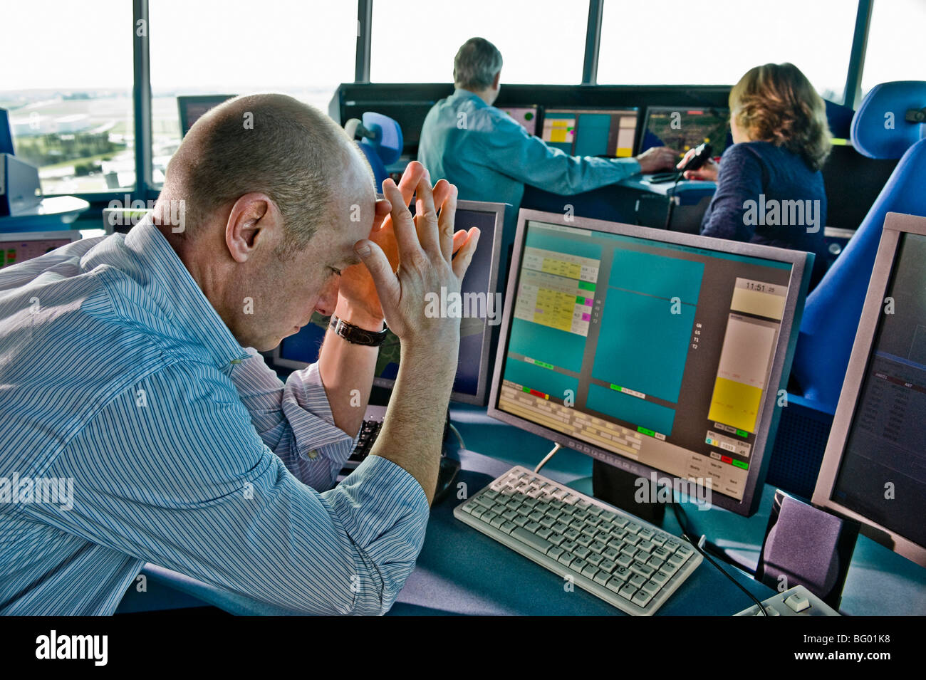 Office operator stress at the computer Stock Photo